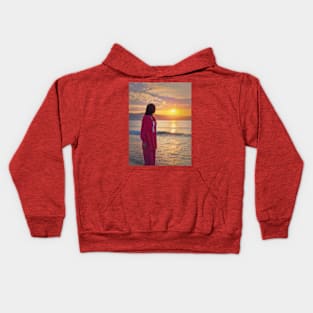 Aesthetic woman meets sunrise on the beach Kids Hoodie